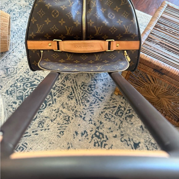 Louis Vuitton canvas rolling duffle bag, gently used. - Picture 10 of 14
